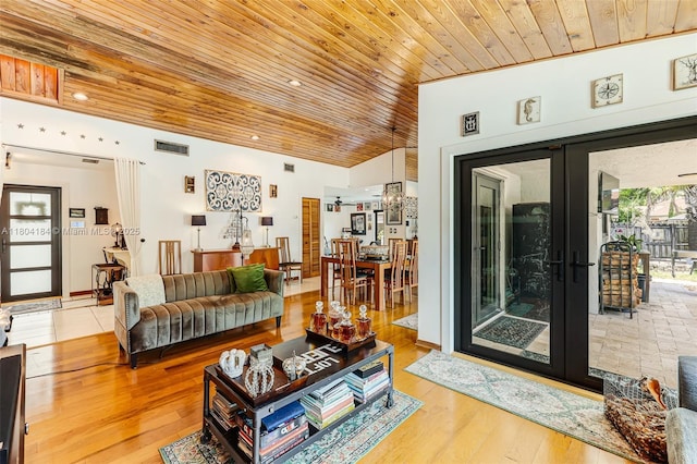 14680 SW 107th Ter, Miami, FL 33186 - living area featuring wood ceiling, french doors, and wood finished floors