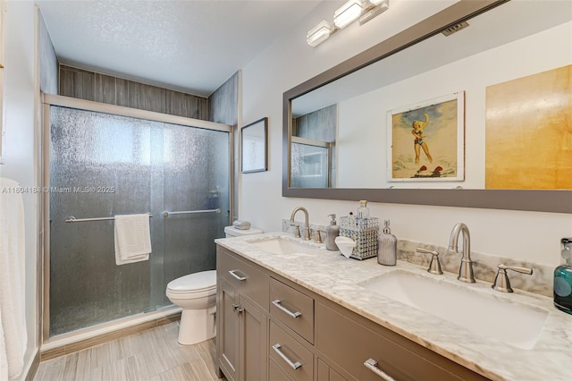 14680 SW 107th Ter, Miami, FL 33186 - bathroom with double vanity, toilet, and a shower stall
