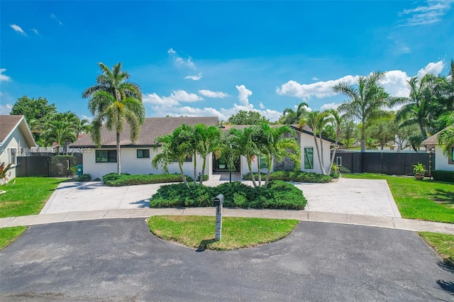 14680 SW 107th Ter, Miami, FL 33186 - view of front of house with stucco siding and driveway