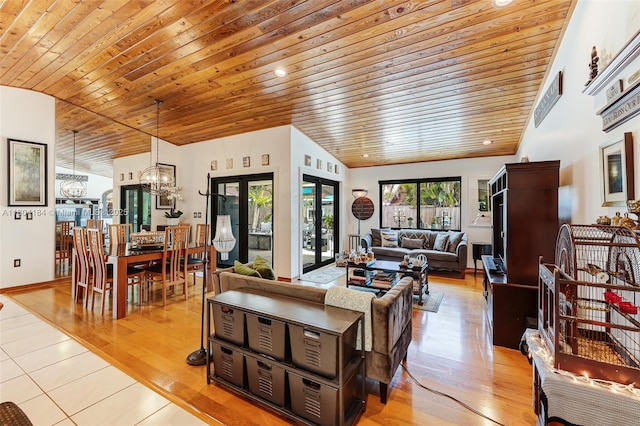 14680 SW 107th Ter, Miami, FL 33186 - living area with wooden ceiling, a chandelier, vaulted ceiling, and light wood finished floors