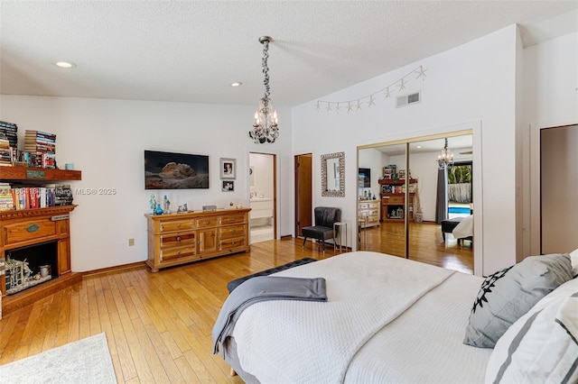 14680 SW 107th Ter, Miami, FL 33186 - bedroom with a chandelier, light wood-type flooring, recessed lighting, baseboards, and a closet