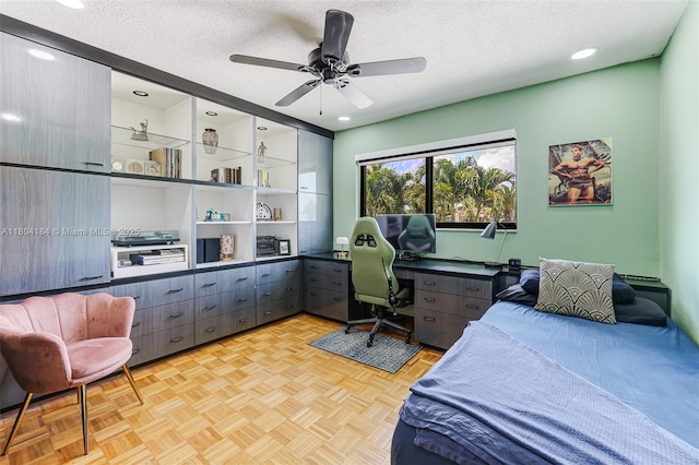 14680 SW 107th Ter, Miami, FL 33186 - bedroom featuring a textured ceiling, an office area, and a ceiling fan