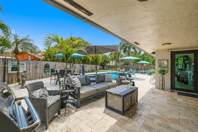 14680 SW 107th Ter, Miami, FL 33186 - fenced backyard with outdoor lounge area, a patio, and outdoor dining area