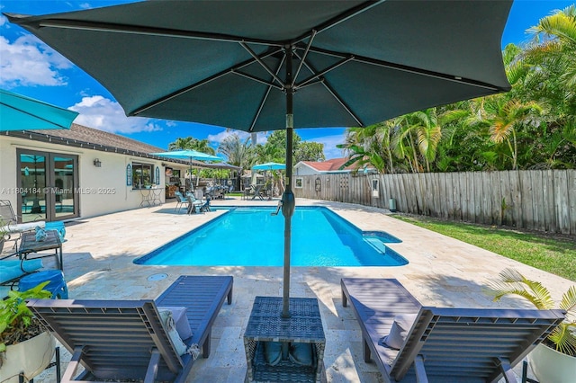 14680 SW 107th Ter, Miami, FL 33186 - view of pool featuring french doors, a fenced backyard, and a patio
