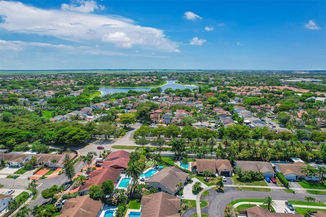 14680 SW 107th Ter, Miami, FL 33186 - aerial perspective of suburban area featuring a large body of water and a pool area