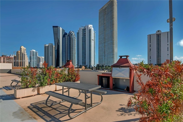 17021 N Bay Rd Unit 329, Sunny Isles Beach, FL 33160 - view of patio featuring a skyline view