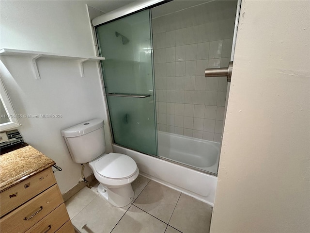 17021 N Bay Rd Unit 329, Sunny Isles Beach, FL 33160 - bathroom featuring vanity, toilet, tile patterned floors, and enclosed tub / shower combo