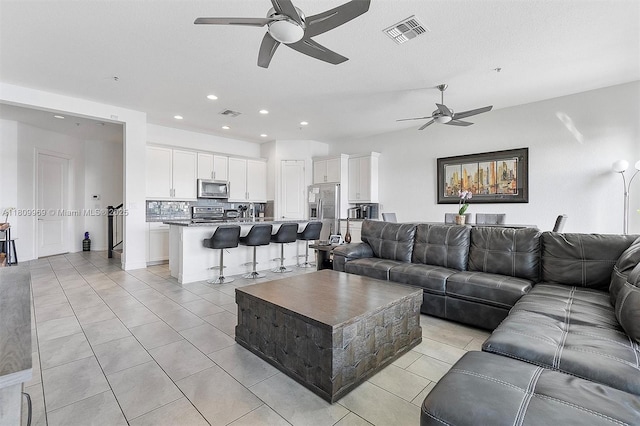 1403 SW 113th Ave, Pembroke Pines, FL 33025 - living area featuring ceiling fan, recessed lighting, and light tile patterned floors