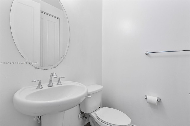 1403 SW 113th Ave, Pembroke Pines, FL 33025 - bathroom with toilet and a sink