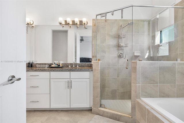 1403 SW 113th Ave, Pembroke Pines, FL 33025 - full bath featuring vanity, a shower stall, a bath, tile patterned floors, and a ceiling fan