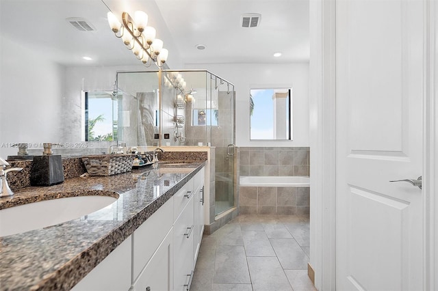 1403 SW 113th Ave, Pembroke Pines, FL 33025 - full bathroom with double vanity, a shower stall, a garden tub, tile patterned flooring, and recessed lighting