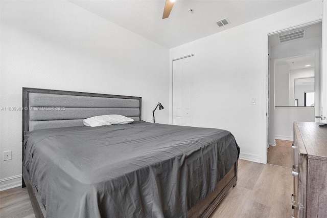 1403 SW 113th Ave, Pembroke Pines, FL 33025 - bedroom with light wood-style floors, baseboards, ceiling fan, and a closet