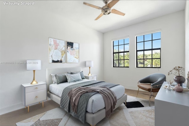 1403 SW 113th Ave, Pembroke Pines, FL 33025 - bedroom featuring baseboards, light carpet, and ceiling fan