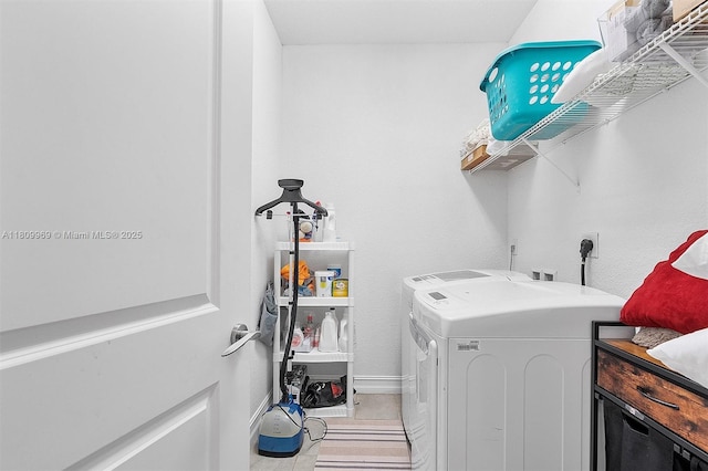 1403 SW 113th Ave, Pembroke Pines, FL 33025 - washroom with washer and clothes dryer, tile patterned flooring, and baseboards
