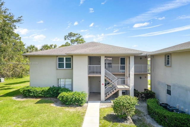 20 Lake Vista Trl Unit 107, Port St Lucie, FL 34952 - view of property with stairway