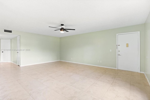 20 Lake Vista Trl Unit 107, Port St Lucie, FL 34952 - empty room featuring a ceiling fan and baseboards