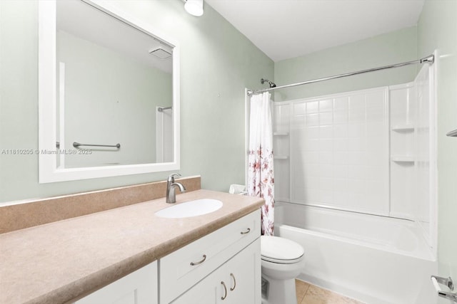 20 Lake Vista Trl Unit 107, Port St Lucie, FL 34952 - full bathroom featuring vanity, toilet, shower / bath combo with shower curtain, and tile patterned floors