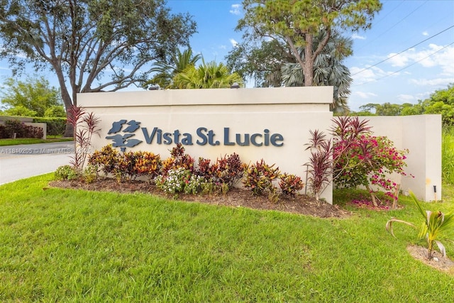 20 Lake Vista Trl Unit 107, Port St Lucie, FL 34952 - community / neighborhood sign featuring a lawn
