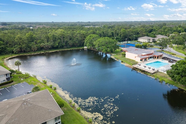 20 Lake Vista Trl Unit 107, Port St Lucie, FL 34952 - bird's eye view of a large body of water, a forest, and a pool
