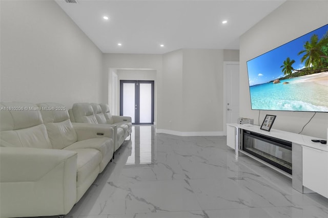 21305 SW 177th Ct, Miami, FL 33187 - living area with recessed lighting, french doors, and light marble finish flooring