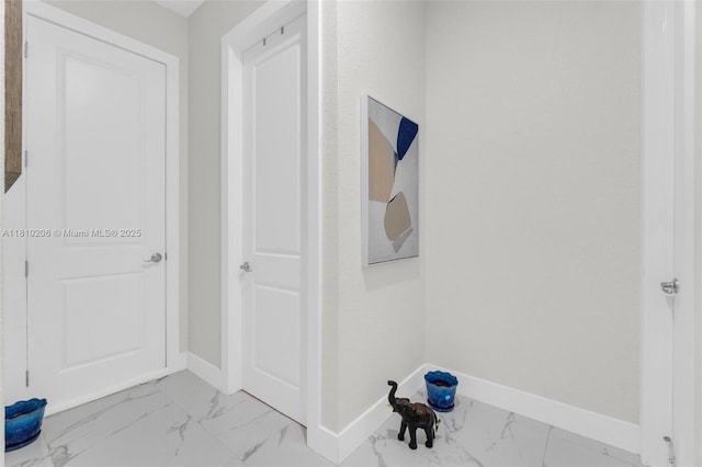 21305 SW 177th Ct, Miami, FL 33187 - corridor with light marble finish floors and baseboards