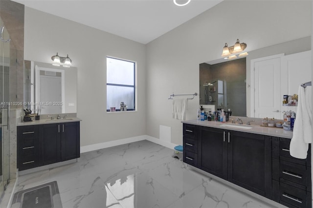 21305 SW 177th Ct, Miami, FL 33187 - bathroom with a stall shower, two vanities, and marble finish flooring