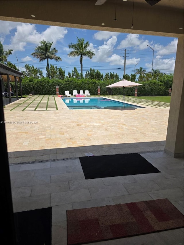 21305 SW 177th Ct, Miami, FL 33187 - view of swimming pool with a ceiling fan and a patio