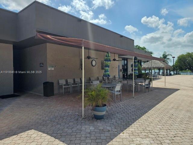 900 Colony Point Cir Unit 505, Pembroke Pines, FL 33026 - view of patio featuring outdoor dining area