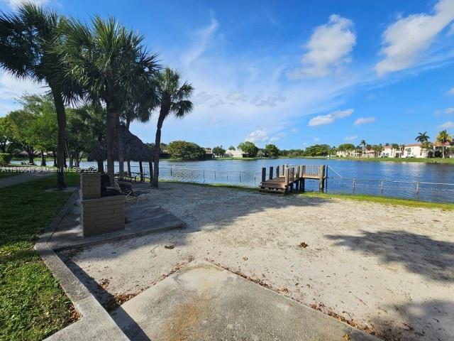 900 Colony Point Cir Unit 505, Pembroke Pines, FL 33026 - view of property's community featuring a boat dock and a water view