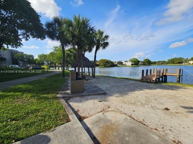 900 Colony Point Cir Unit 505, Pembroke Pines, FL 33026 - dock featuring a water view