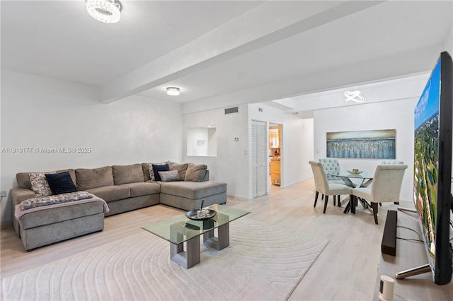 760 E Coco Plum Cir, Plantation, FL 33324 - living area with light wood finished floors and beam ceiling