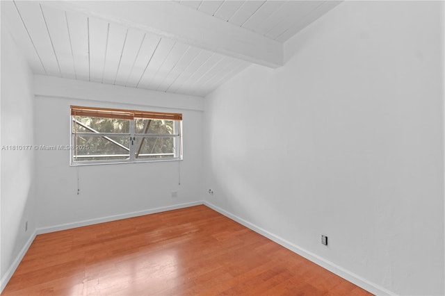 760 E Coco Plum Cir, Plantation, FL 33324 - unfurnished room featuring light wood-style floors, wood ceiling with exposed beams, and baseboards
