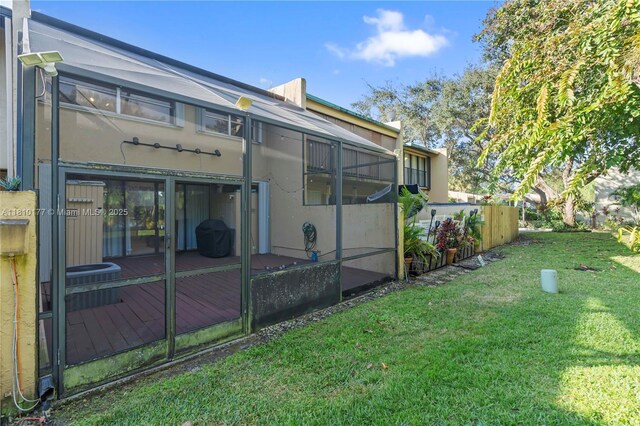 760 E Coco Plum Cir, Plantation, FL 33324 - back of house featuring stucco siding and a wooden deck