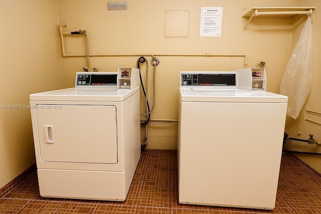 4660 NW 79th Ave Unit 1C, Doral, FL 33166 - communal laundry room with separate washer and dryer and baseboards