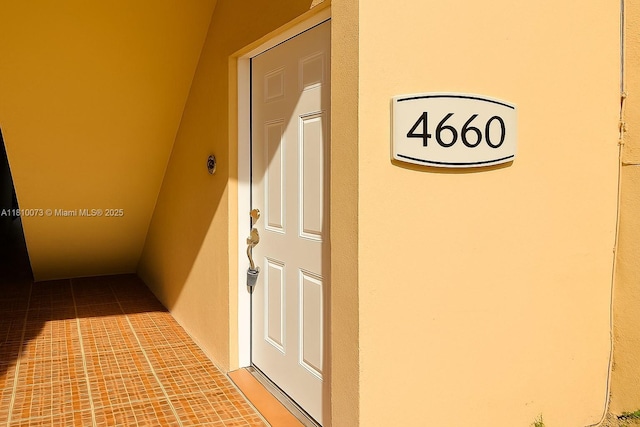 4660 NW 79th Ave Unit 1C, Doral, FL 33166 - property entrance with stucco siding