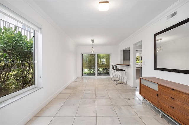 1884 Galleon St Unit 1, North Bay Village, FL 33141 - hall with crown molding, light tile patterned floors, and baseboards