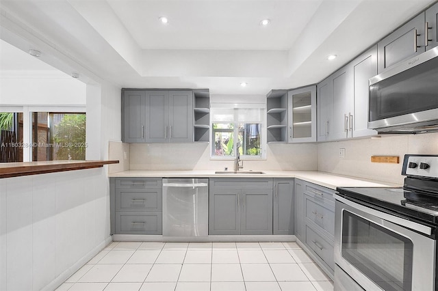 1884 Galleon St Unit 1, North Bay Village, FL 33141 - kitchen featuring gray cabinets, stainless steel appliances, a sink, and recessed lighting