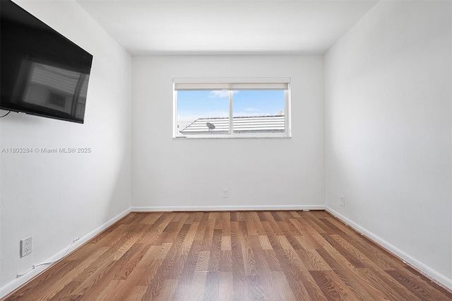 1884 Galleon St Unit 1, North Bay Village, FL 33141 - empty room featuring wood finished floors and baseboards