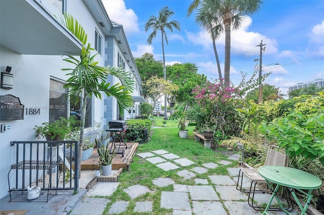 1884 Galleon St Unit 1, North Bay Village, FL 33141 - view of grassy yard featuring a patio