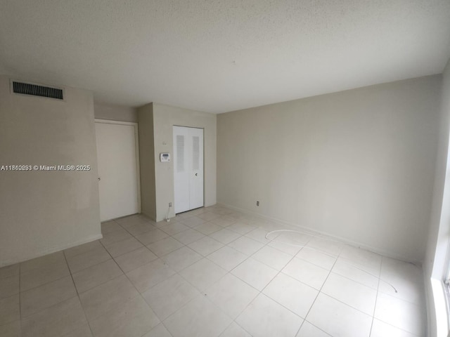 1500 N Congress Ave Unit B53, West Palm Beach, FL 33401 - unfurnished room with light tile patterned floors