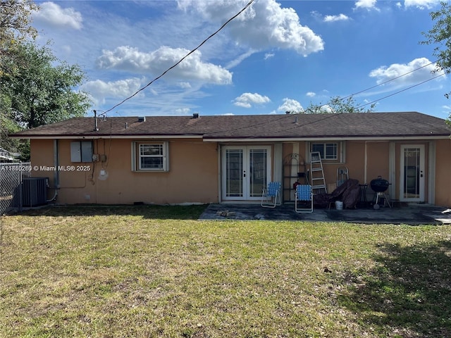16320 SW 100th Ct, Miami, FL 33157 - rear view of property featuring central AC unit, a patio area, stucco siding, and french doors