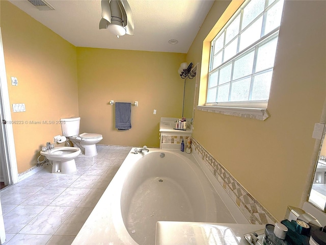 9772 SW 159th Ave, Miami, FL 33196 - bathroom featuring a bidet, a bath, toilet, and tile patterned flooring