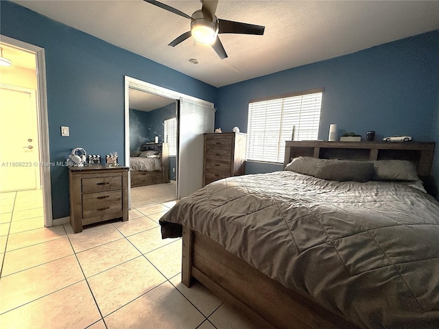 9772 SW 159th Ave, Miami, FL 33196 - bedroom with light tile patterned floors, a closet, and ceiling fan