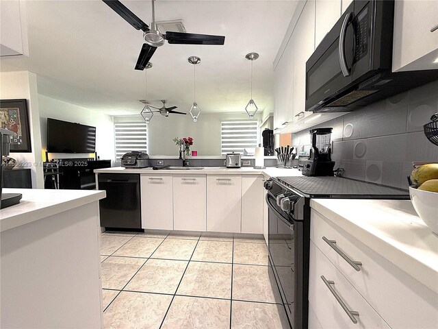 9772 SW 159th Ave, Miami, FL 33196 - kitchen with black appliances, ceiling fan, white cabinets, a sink, and light countertops