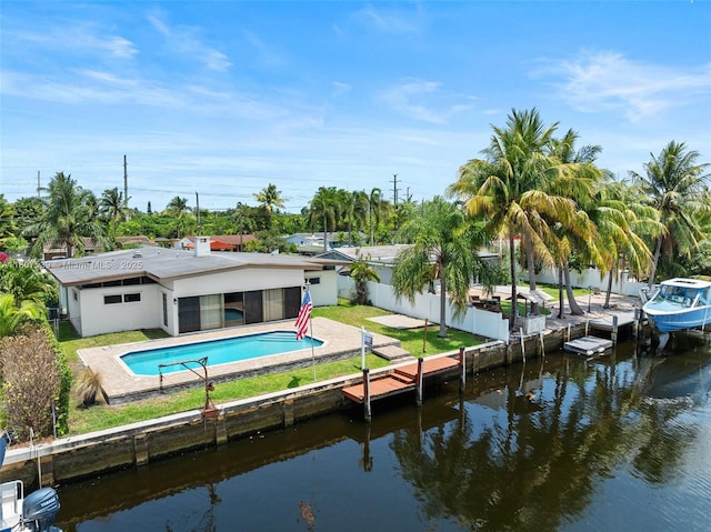 4465 SW 37th Ave, Dania Beach, FL 33312 - back of property with stucco siding, a water view, a sunroom, and a patio area