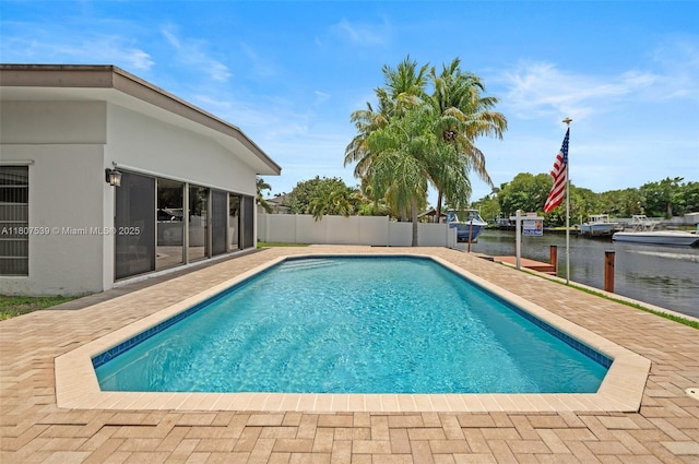 4465 SW 37th Ave, Dania Beach, FL 33312 - outdoor pool featuring a water view and a patio