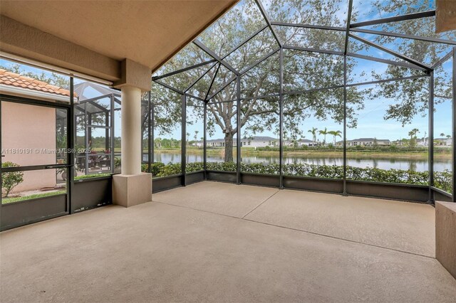 9212 Short Chip Cir, Port St Lucie, FL 34986 - unfurnished sunroom with a water view