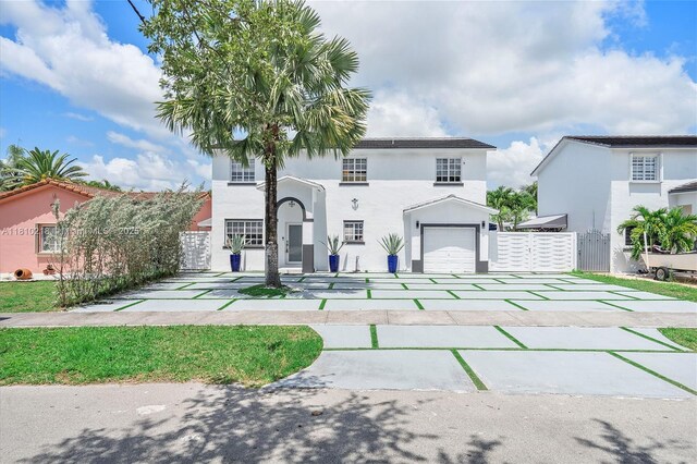 18110 SW 153rd Ct, Miami, FL 33187 - mediterranean / spanish-style home with a gate, concrete driveway, and stucco siding