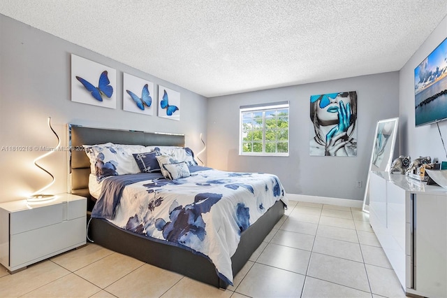 18110 SW 153rd Ct, Miami, FL 33187 - bedroom with a textured ceiling and light tile patterned floors