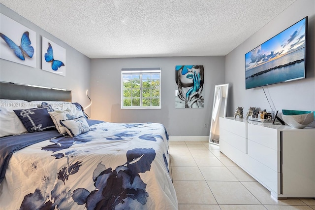 18110 SW 153rd Ct, Miami, FL 33187 - bedroom with light tile patterned flooring and a textured ceiling